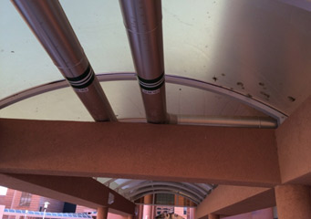 Figure 3: Chilled Water distribution Pipes running under corridor roof and with similar painting of the roof.